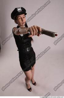 27 NIKITA POLICEWOMAN STANDING POSE WITH TWO GUNS